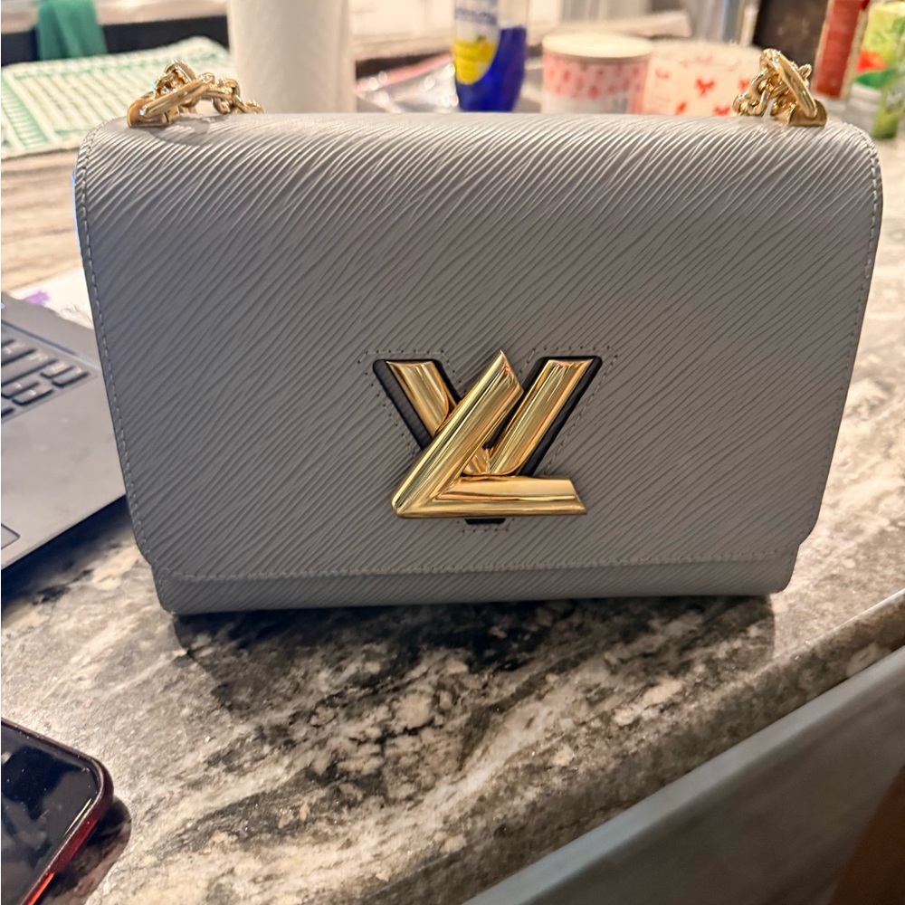Louis Vuitton Gray Crossbody Bag with Gold Accent